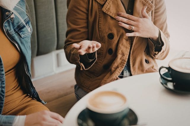 Family members having a calm conversation about cremation decisions in Texas