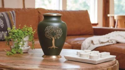Tree of Life urn displayed at home as a meaningful memorial after cremation.