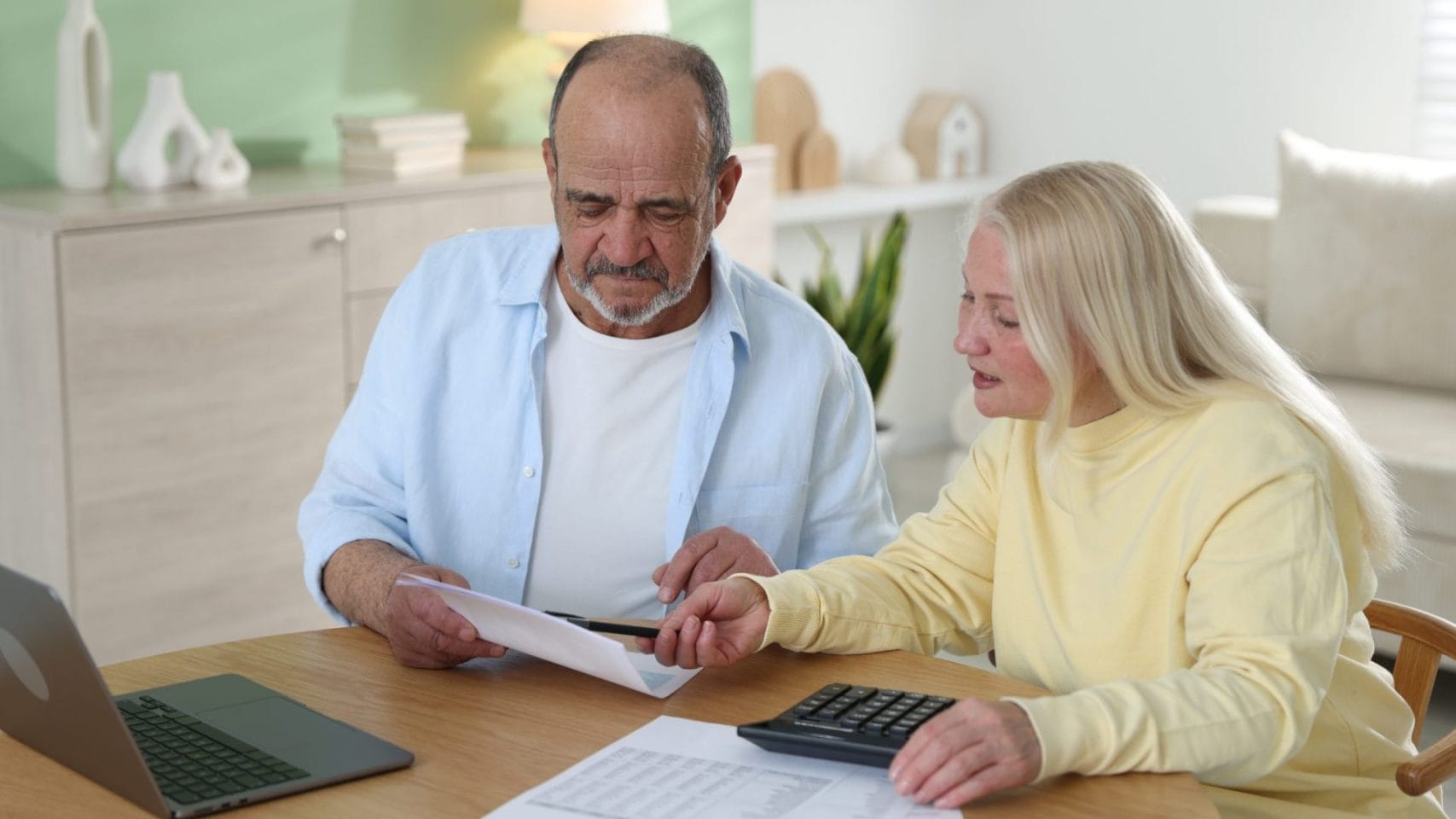 Couple reviewing online cremation arrangements and pricing near Texas City, Texas.