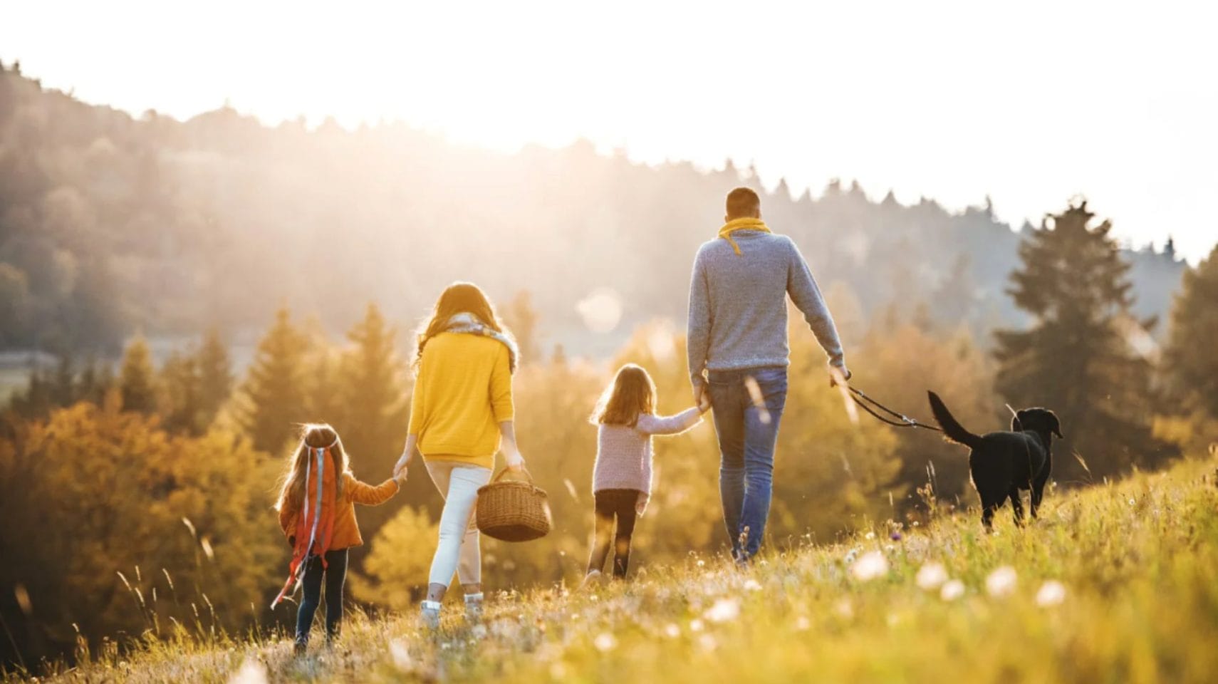 Family walking together remembering a loved one after cremation