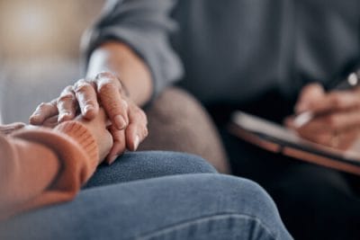 Closeup, hands and support